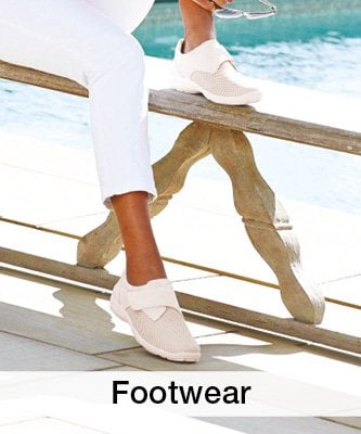 Image of ladies white slip on trainers